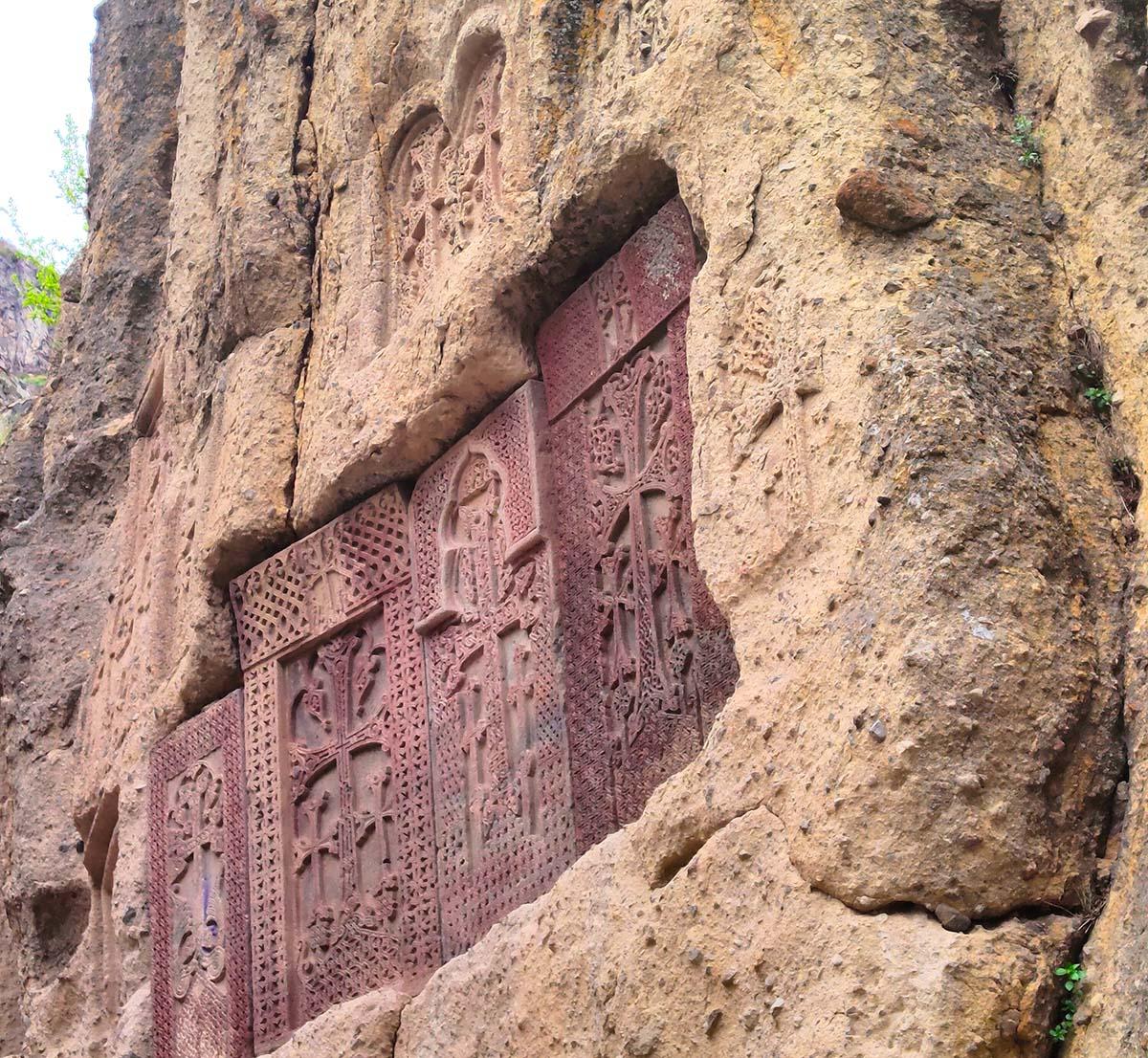 Cross stones carved into the rock. Photo by Vardan Papikyan